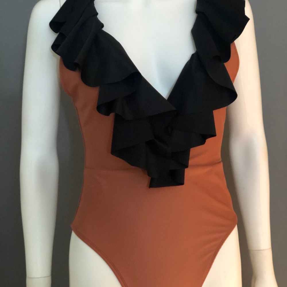 Swimsuit, bodysuit.